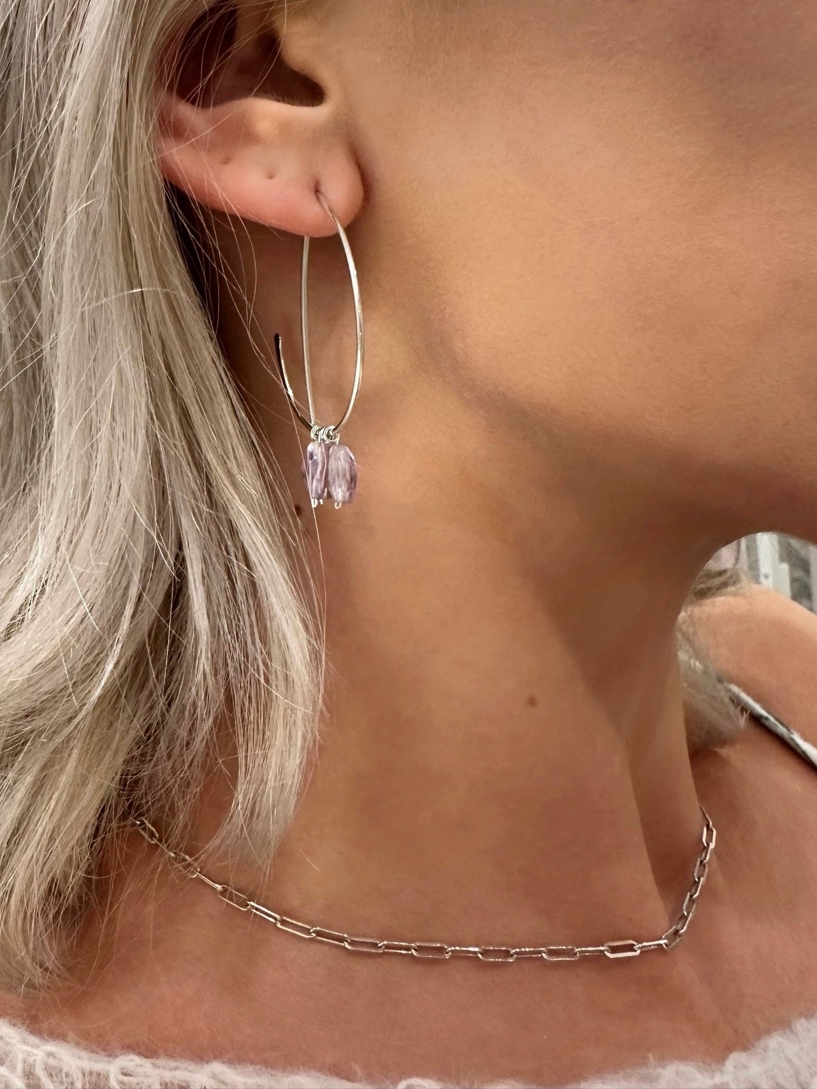 Lila amethyst demi hoops, silver half hoop earrings, hammered hoop earrings, sterling silver amethyst earrings on model
