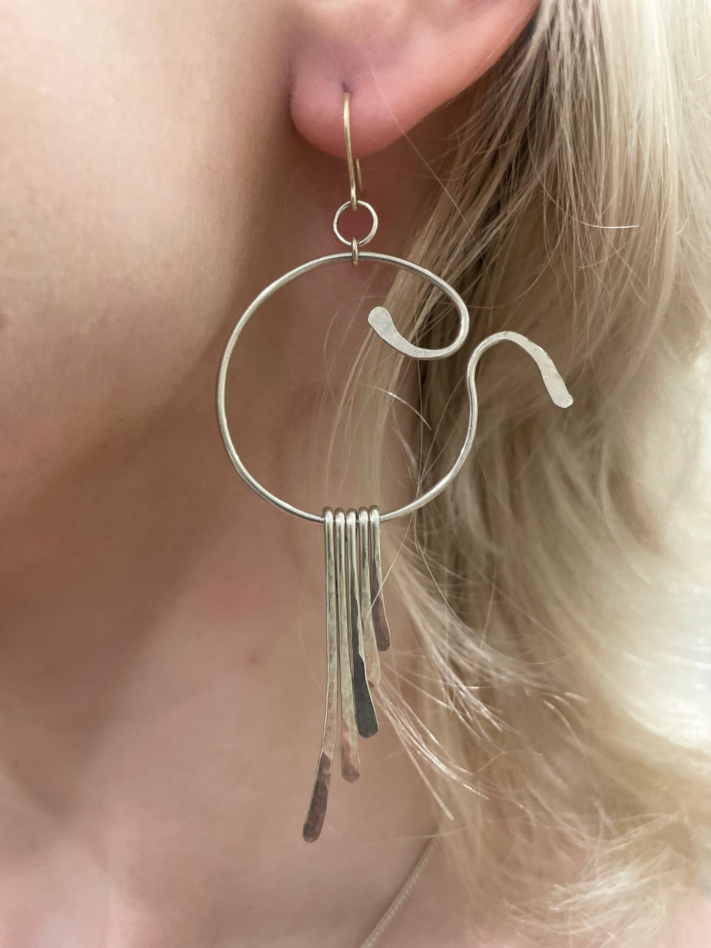 Akila hoop and drop earrings, silver wing earrings, hammered silver earrings on model