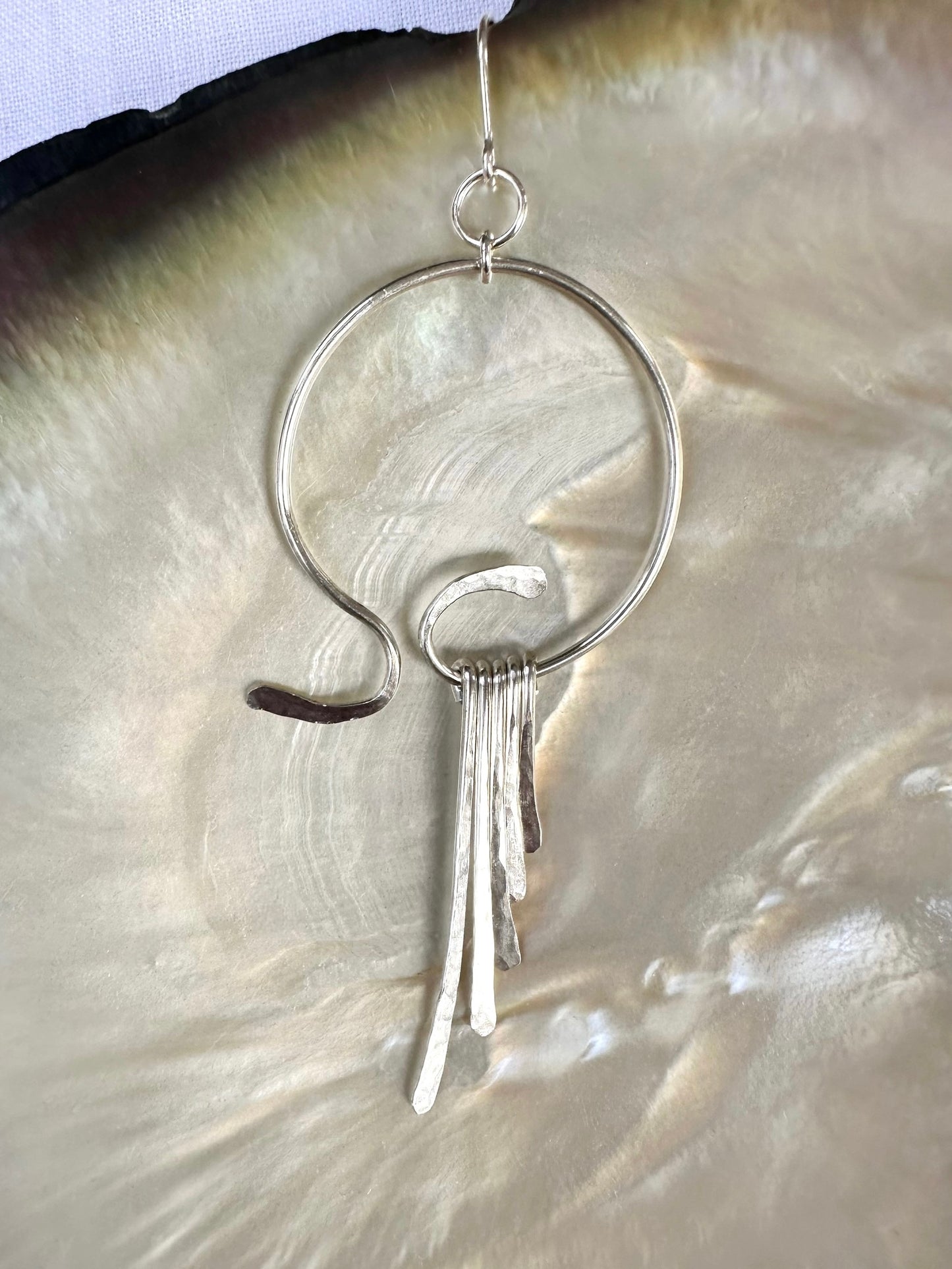 Akila hoop and drop earrings, silver wing earrings, hammered silver earrings on shell