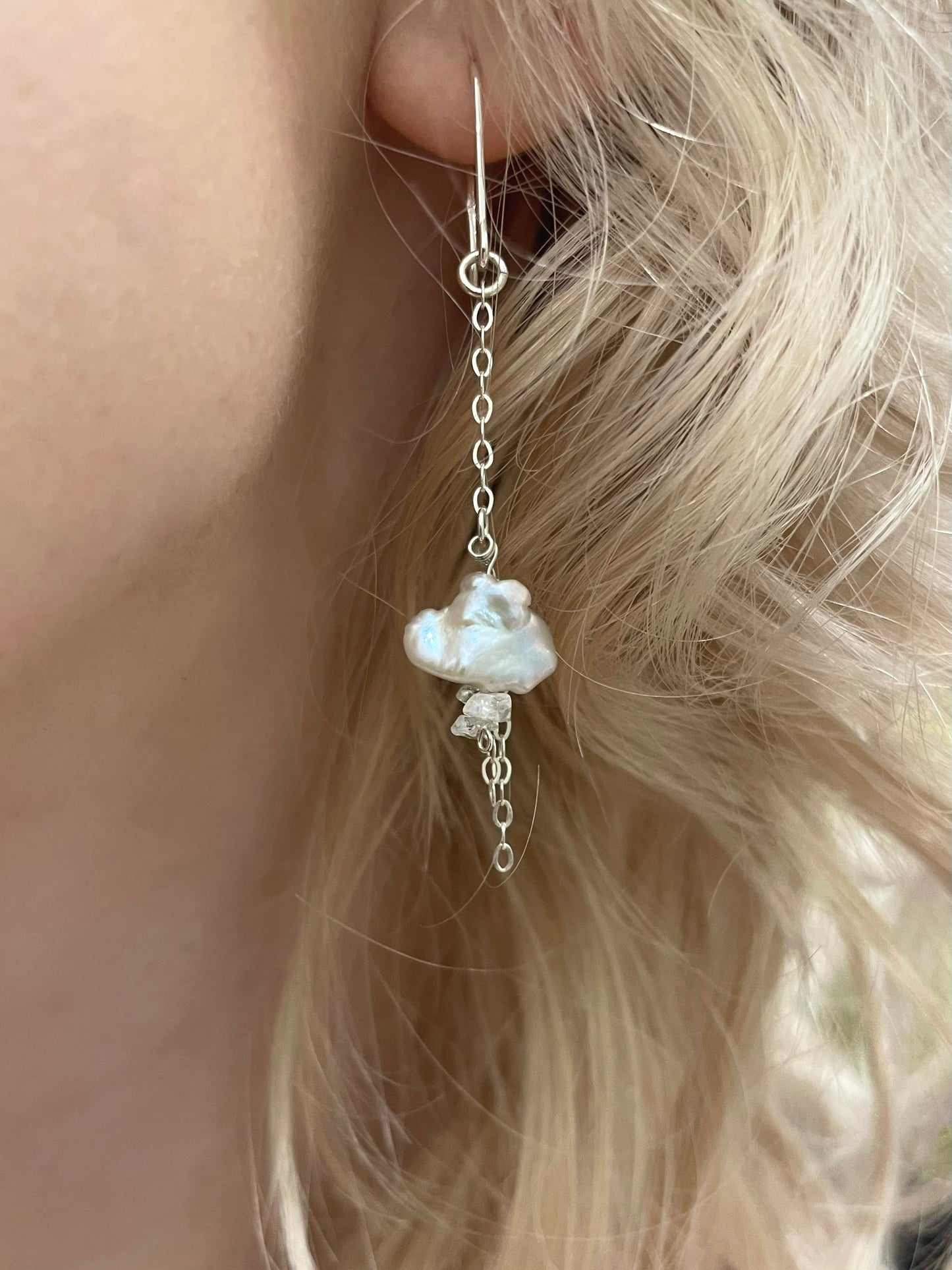 Lluvia drop earrings, cloud earrings, on model