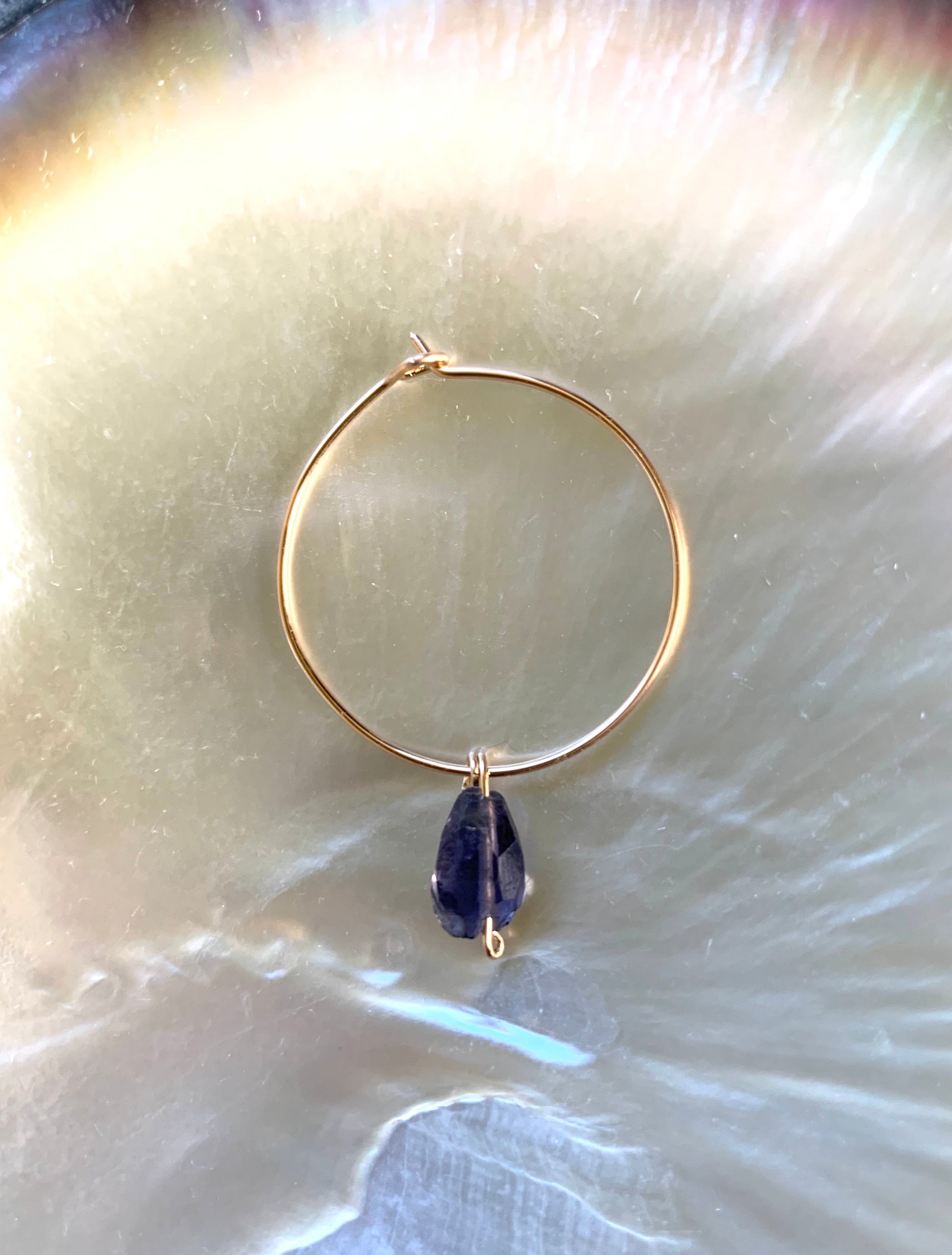 Sienna hoop earrings, navy blue stone earrings, iolite earrings in gold on shell